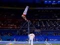 Men's gymnastics high bar releases and dismounts