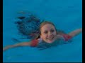 Livinia Nixon jumping into a pool