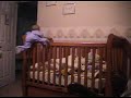 Baby Savannah climbing out of crib