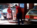 Clark Griswold at the gas pump- Chevy Chase VACATION Best scene