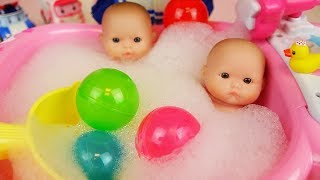 Baby doll bath with surprise eggs