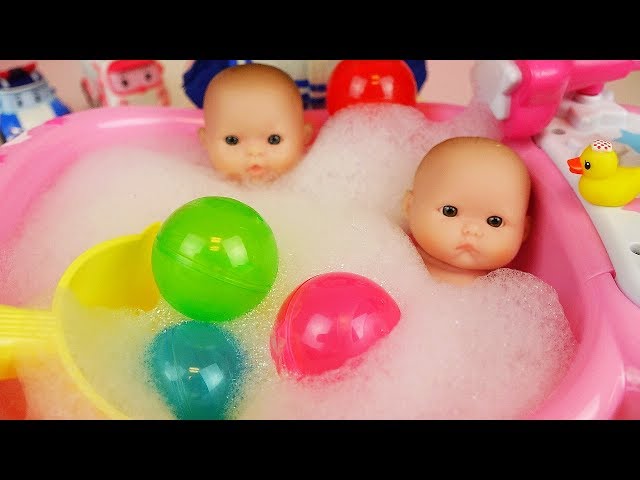Baby doll bath with surprise eggs