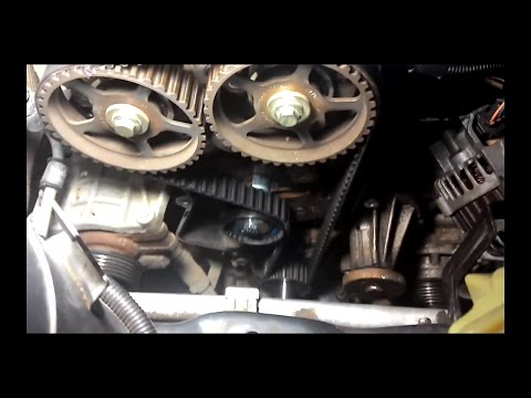 Расположение у Ford Фьюжн натяжного ролика ремня генератора
