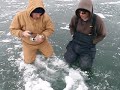 SUPER CRAZY AWESOME Ice fishing video of a big brown trout fighting under glare ice.AVI