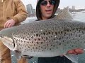 SUPER CRAZY AWESOME Ice fishing video of a big brown trout fighting under glare ice.AVI