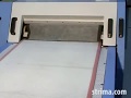 Fusing interlining - Oshima machine with powerful pressure video