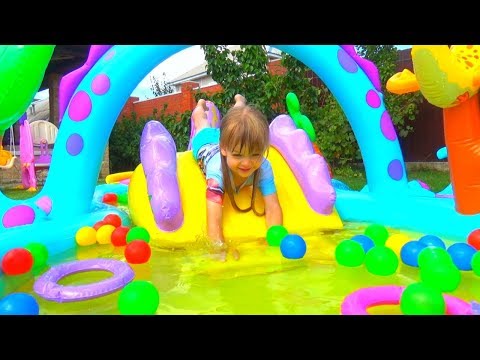 Kid Pretend Play with Water Slide Inflatable Toys and Fruits