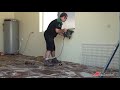 Using stud finder to find & mark your holes on garage wall