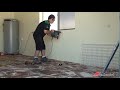 Using stud finder to find & mark your holes on garage wall