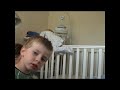 Baby Art makes his escape from cot /crib