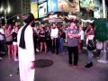 MUSLIM MAN GETTING READY TO FIGHT IN TIME SQUARE N.Y