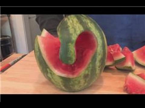 watermelon carving for baby shower. Carve a watermelon into the shape of a swan by cutting off the bottom of the watermelon, drawing a picture of the swan on the watermelon skin and cutting