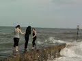 Me,Lauren and Mollie get soaked by the sea ^.^