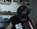 Soikis playing the accordion badly