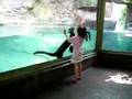 otters chasing little girl