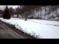 Justin riding the new quad in the last snow of 2013 hopefully !