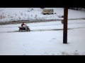 Justin riding the new quad in the last snow of 2013 hopefully !