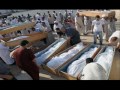 Muammar Al Gaddafi death metal object in his head