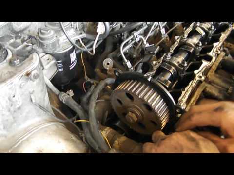 ГТ' Замена маслосъемных колпачков клапанов на двигателе Nissan СD-17