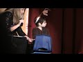 Holiday Show at Overbrook. Amy narrates using a Prentke Romich Vantage Lite (2)