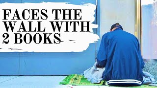 WHAT HE DOES WITH 2 BOOKS WILL AMAZE YOU
