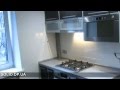 современная кухня с фасадами в металлических рамках