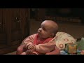 Baby makes funny faces eating