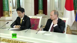 Пресс-конференция В. Путина и премьер-министра Японии
