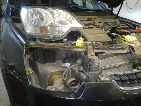 Замена ламп ближнего света Opel Antara 2012.