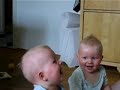 laughing twins - twin babies laugh at their father
