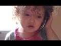 Funny baby talking on phone