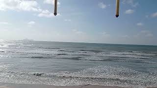 Sending Salutations (Selawat) to Prophet Muhammad (ﷺ) while relaxing in a peaceful beach