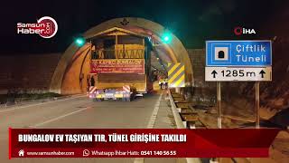 Bungalov ev taşıyan tır, tünel girişine takıldı