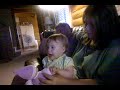 Rebekah kissing baby doll
