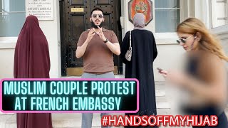 COUPLE PROTEST HIJAB BAN AT FRENCH EMBASSY - #HANDSOFFMYHIJAB