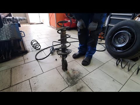 Replacement of the shock absorber spring on the Lada Vesta car.