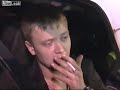 Drunk Russian driver makes phone call with pack of cigarettes