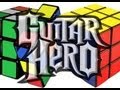 Il resout 2 rubik s cube en jouant a Guitar Hero. Inutile me direz vous :)