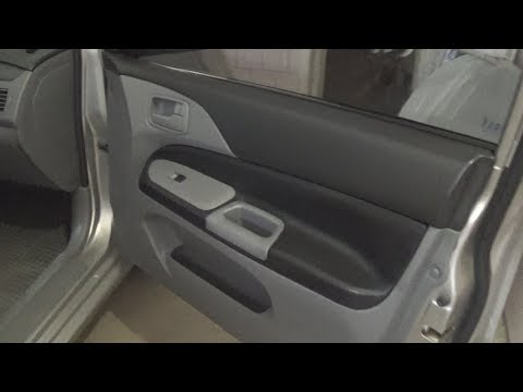 Обшивка дверных карт натуральной кожей в Mitsubishi Lancer 9