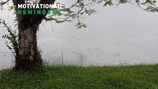 Allahumma Azirni Minan Nar - Making Dua of protection from hell near a lake on a rainy day