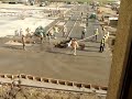 Construction Accident - Concrete motor trowel gone wild at a construction site.flv