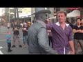 Guy gets punched by street performer! (Original)