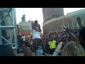 Wiz Khalifa falls on stage performing in Boston