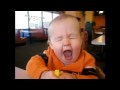baby eating lemon spitting
