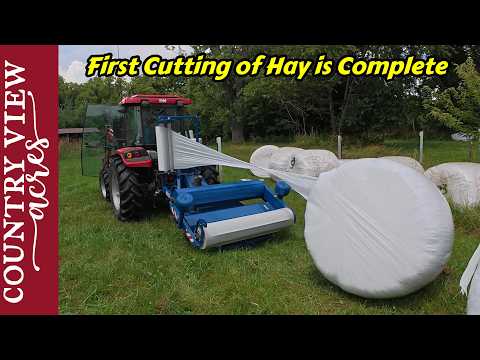 Wrapping Hay Bales Before the Rain.  The New Pig Feeder May have a Problem