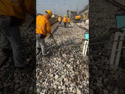 Railway workers flatten the stones. #craft #work