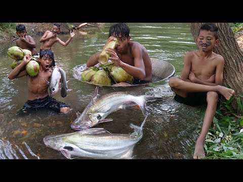 Survival in the rainforest - Cooking tow fish recipe and eating . primitive boy