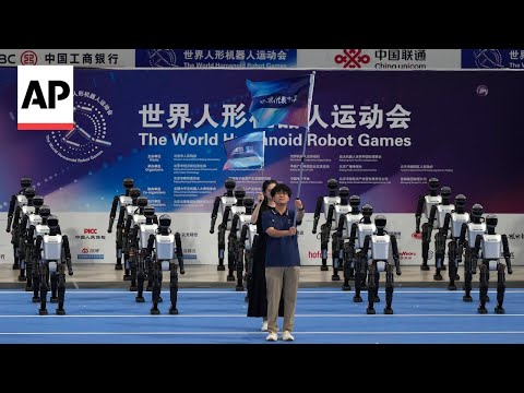 YouTube video thumbnail: China's Tournament for AI Robots Opens With Dancing, Soccer, Boxing, Track