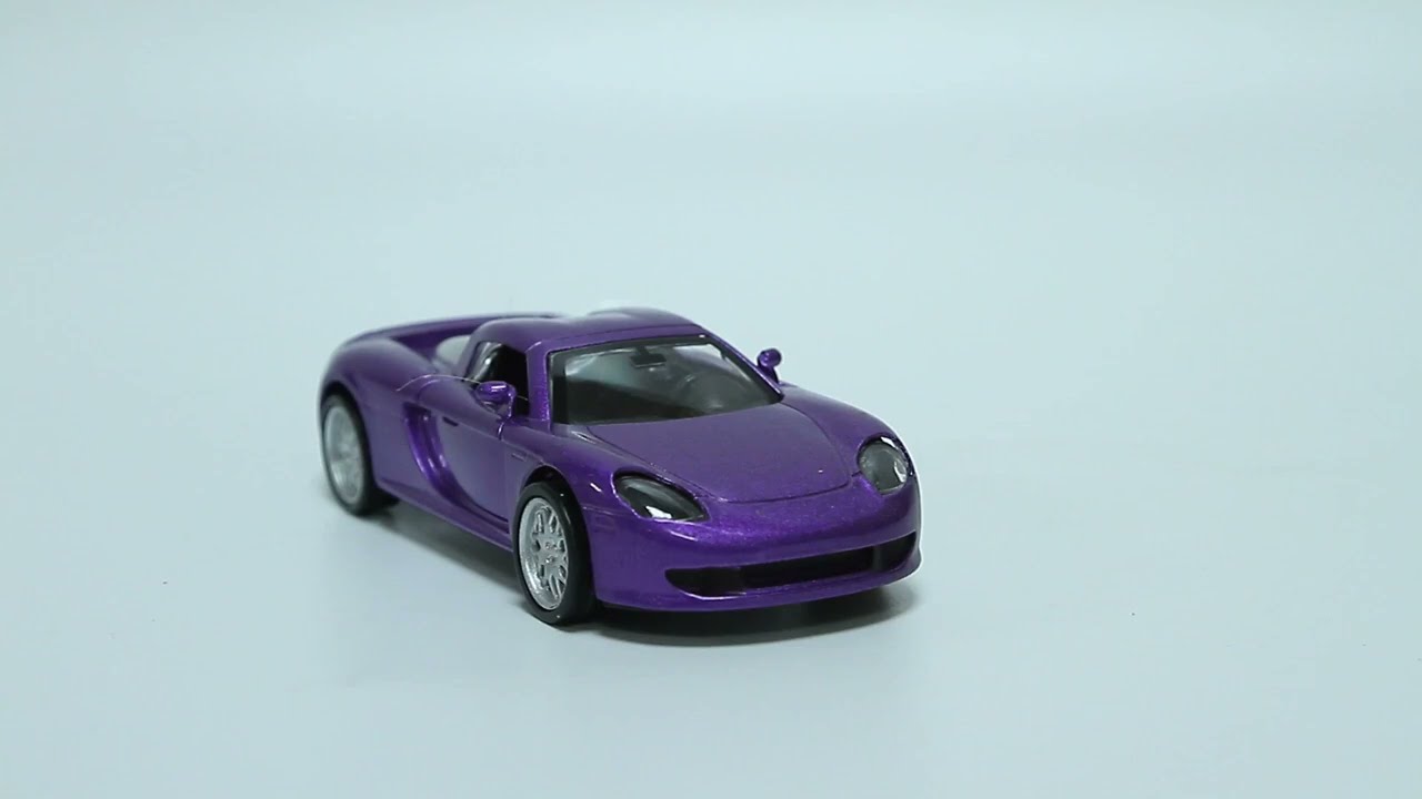 Автомобиль спорткар Porsche kings toy инерционный световые звуковые эффекты металлический фиолетовый 1:36 - видео