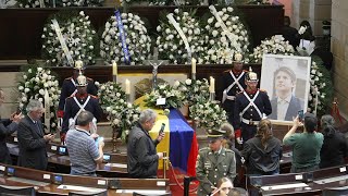 Colombians attend wake at Congress of presidential hopeful | AFP